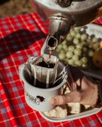 VS Drip Filter Coffee being poured into a Voetspore mug