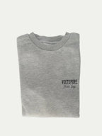 Mooi Loop Grey Crew Neck Sweater front view with Voetspore branding